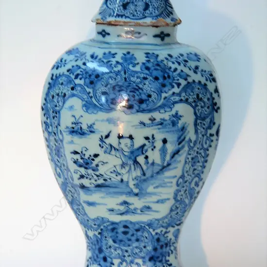 An 18th/19thC Dutch Delft chinoiserie lidded urn