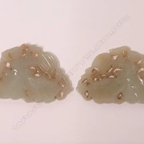 A pair of Chinese carved jade small panels