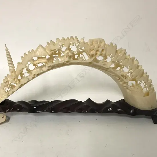 A Chinese carved hippo tusk