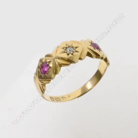 An 18ct. yellow gold ruby and diamond ring