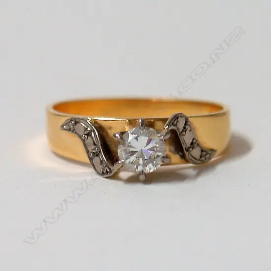 A lady's estate 18ct. yellow gold diamond solitaire ring