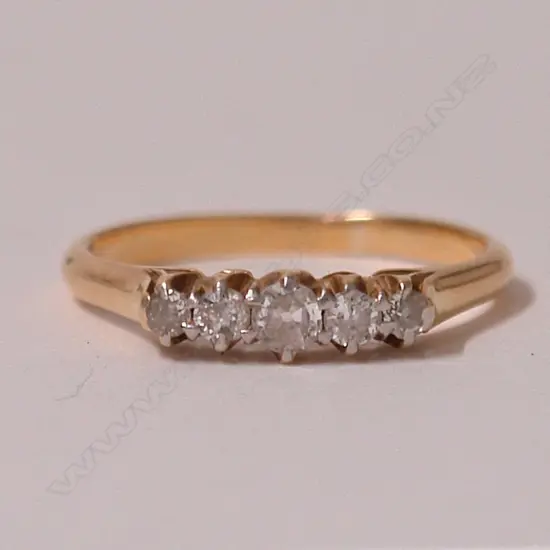 A lady's estate 18ct. yellow gold and five stone diamond ring