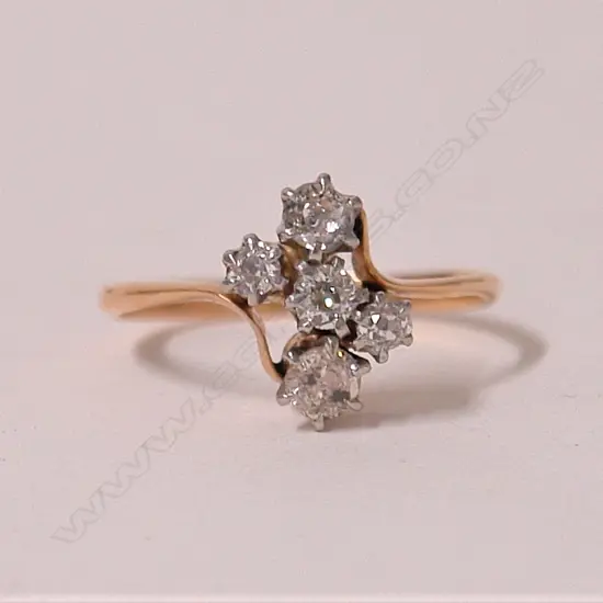 A lady's estate 18ct. yellow gold and five stone diamond ring