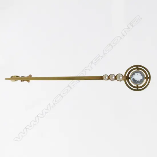 A 15ct. yellow gold aquamarine and seed pearl brooch