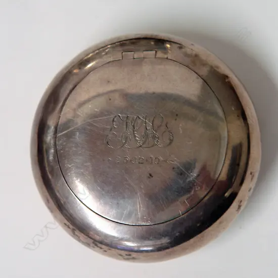 An Edwardian silver circular tobacco box