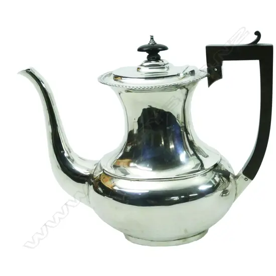 A George IV silver coffee pot