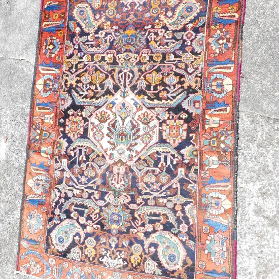 A hand knotted Hamadan rug