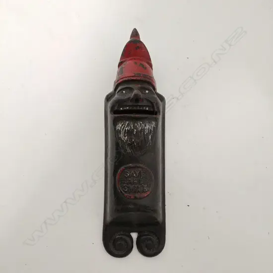 A vintage cast iron hanging Santa money bank