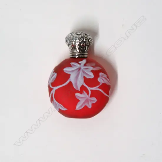 A small Victorian Thomas Webb cameo glass silver topped scent bottle