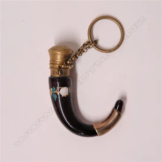 A Victorian deep amethyst glass scent phial