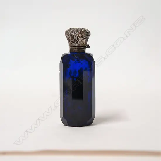A Victorian Bristol blue glass and silver topped scent bottle