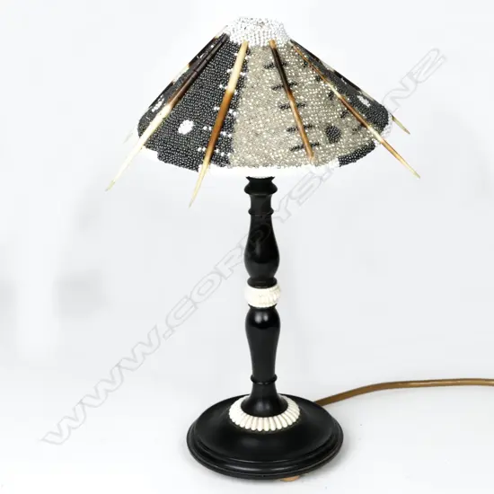 A fine quality Victorian turned ebony table lamp
