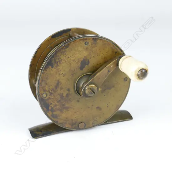 An early 2½” x 1” fishing reel