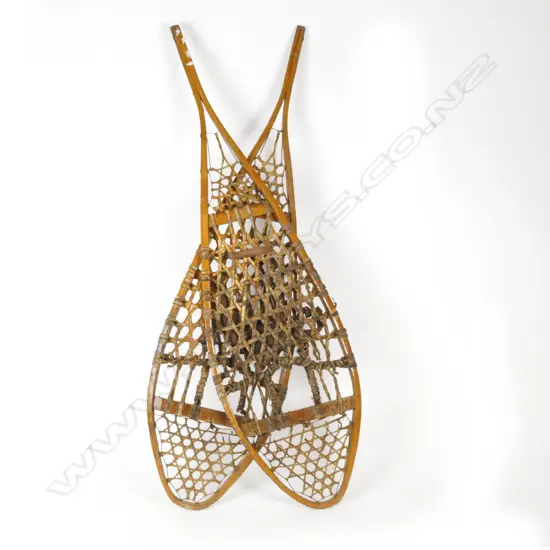 A pair of antique snow shoes