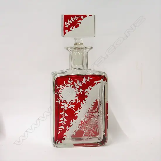 A Bohemian cut glass and red flashed spirit's decanter