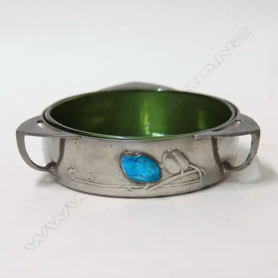 A Liberty & Co. Tudric pewter dish designed by Archibald Knox