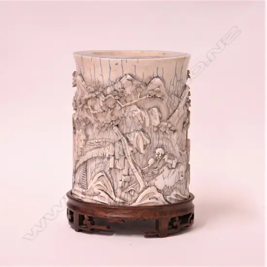 A Chinese carved ivory tusk section brushpot