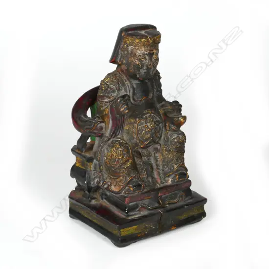 A Qing dynasty period carved wood polychrome decorated shrine figure