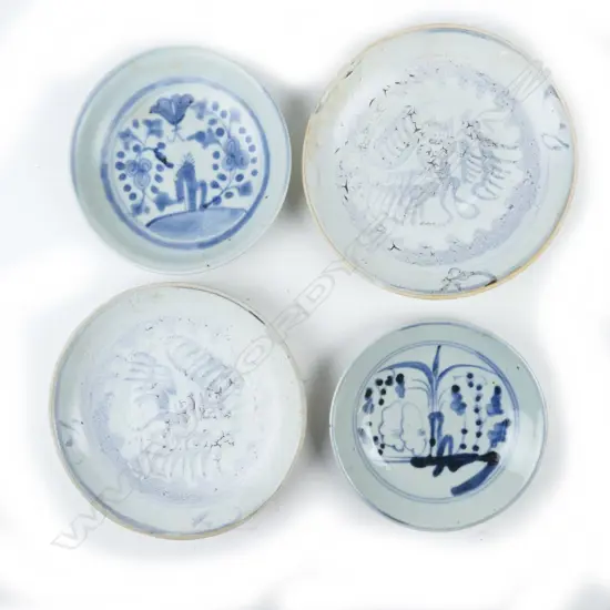 Four small old Chinese blue and white circular dishes