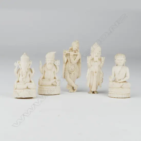 Five small ivory carvings of deities from various religions