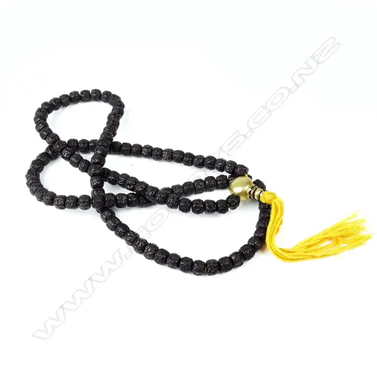 A long rudraksha seed mala bead necklace