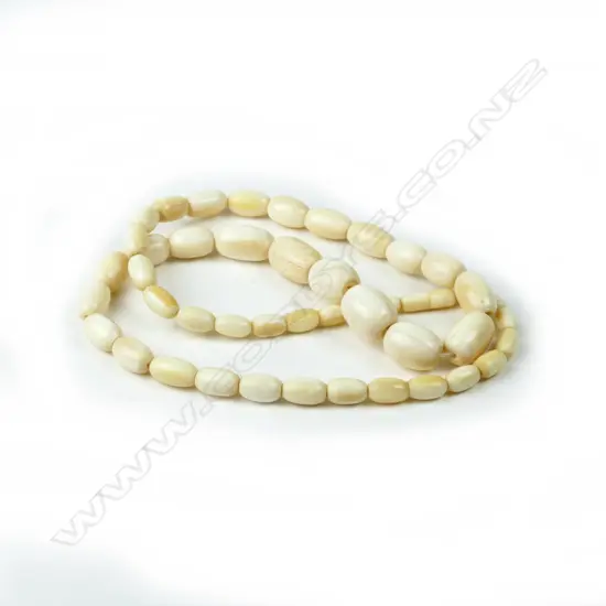 A vintage ivory bead necklace