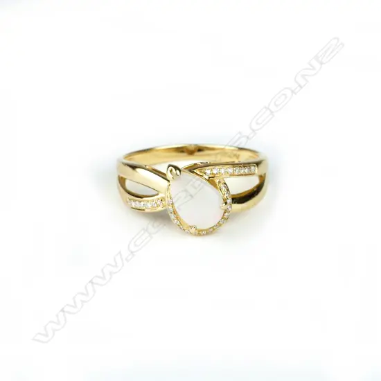 An 18ct. yellow gold opal and diamond dress ring