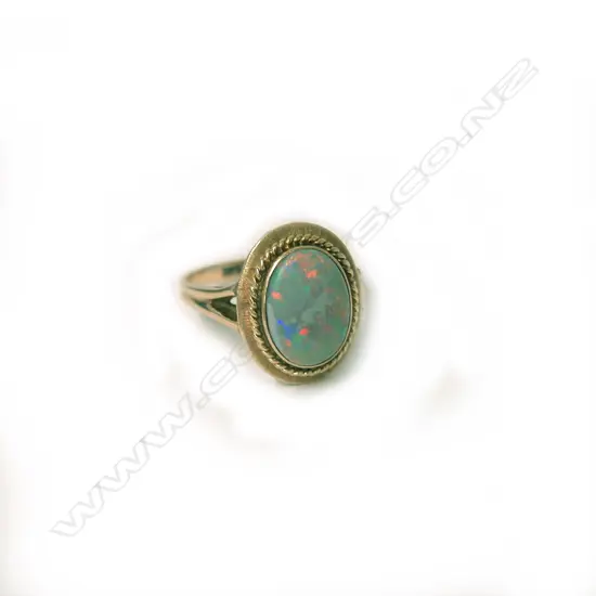 A vintage 14ct. yellow gold and opal dress ring