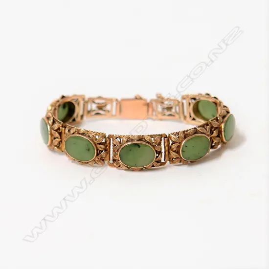 A good vintage 9ct. rose gold and pounamu bracelet