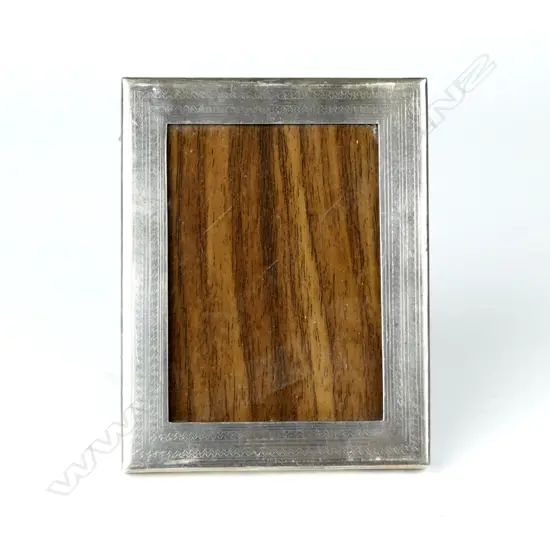 An Egyptian silver photo frame