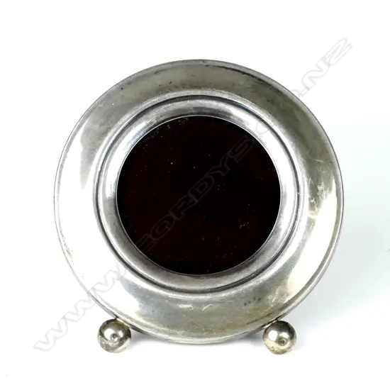 An Egyptian silver photo frame