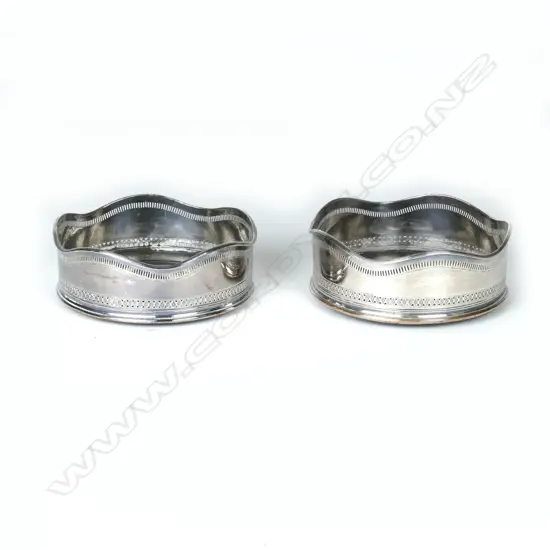 A pair of Georgian Old Sheffield Plate wine coasters