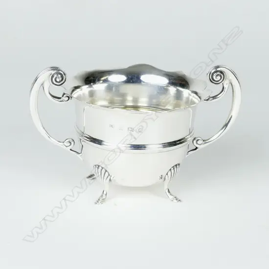 A small Edwardian two handled silver sugar basin