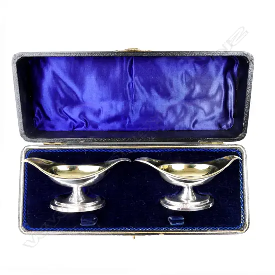A pair of boxed silver salts