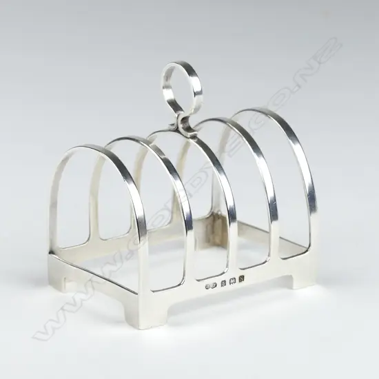 A small silver toast rack