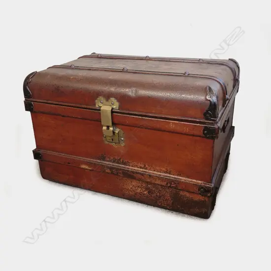 A Victorian metal trunk with studded strapping