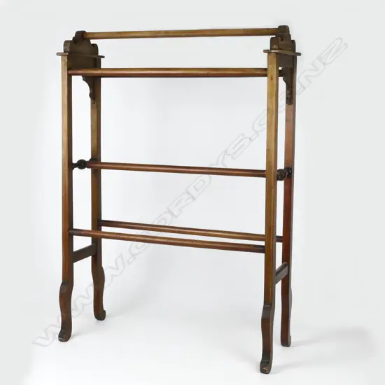 An Edwardian mahogany towel rack