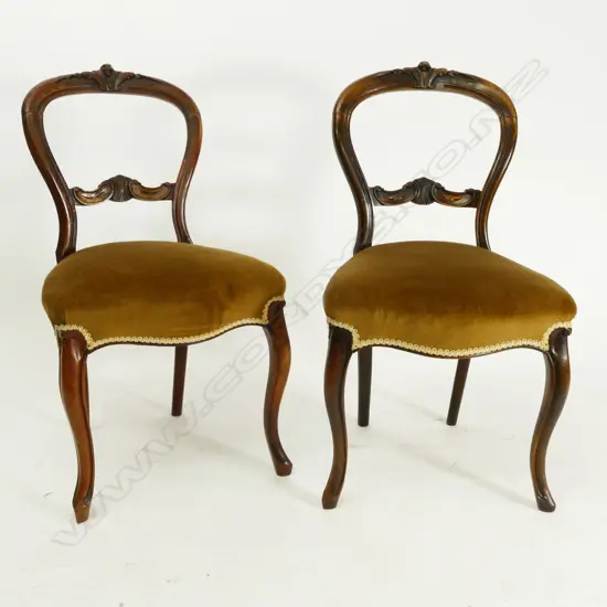 Eight Victorian mahogany balloon back chairs