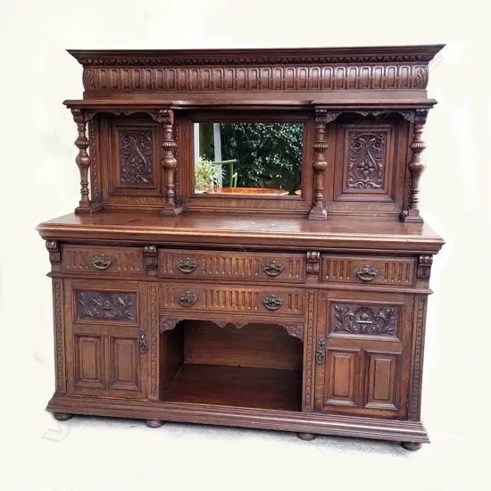 A large vintage oak mirror back sideboard