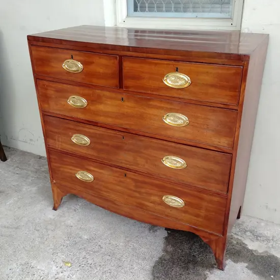 A Georgian mahogany flat front five drawer chest