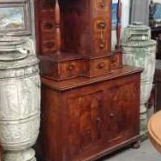 A Continental inlaid cabinet