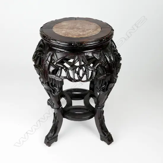 A Chinese hardwood vase stand