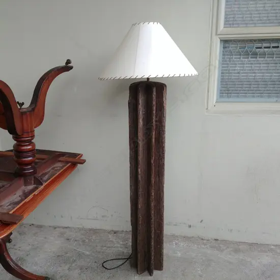 A 19thC wooden agricultural threshing gear converted to a standard lamp