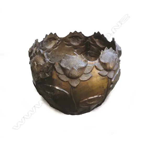 A large bronze jardinière of circular section