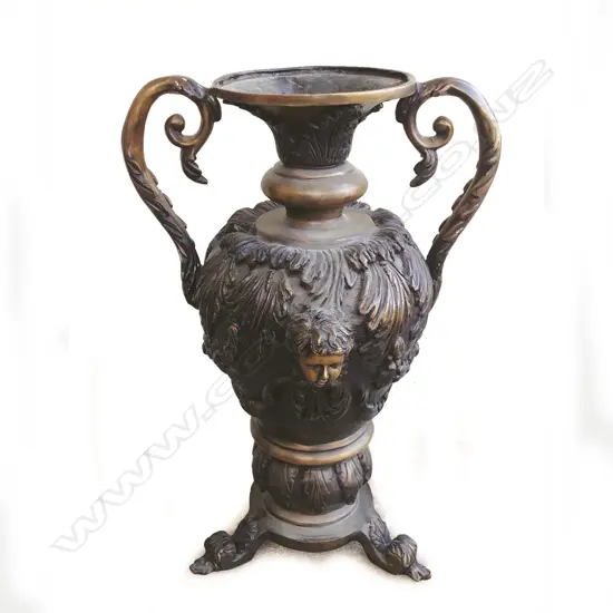 A large bronze two-handled baluster vase