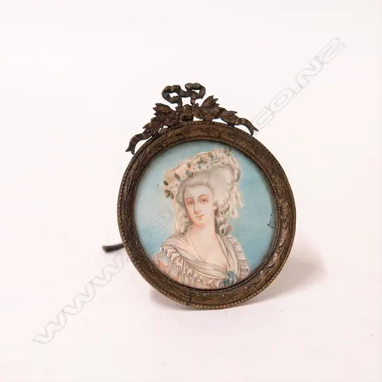 An old portrait miniature of a classical woman