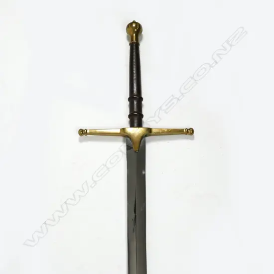 A replica of a double handled Scottish broad sword