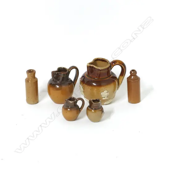 Three miniature salt glazed jugs