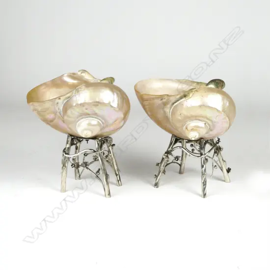 A pair of turn-of-the-century Chinese carved large nautilus shells