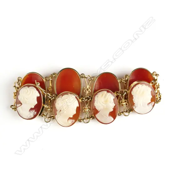 A lady's estate 9ct. yellow gold and cameo set bracelet
